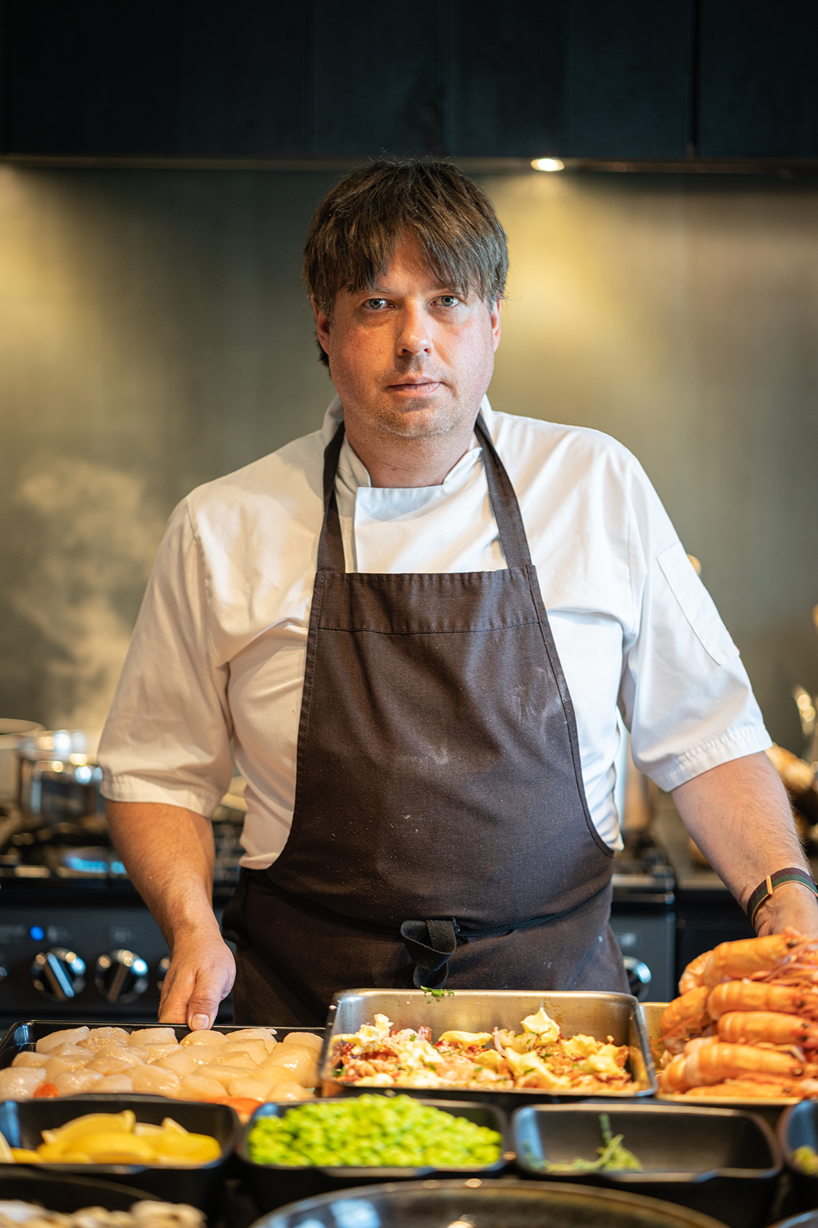 Chef preparing bespoke dining experience